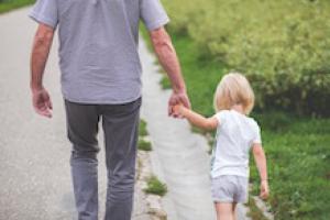 Father and child walking