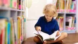 Kid reading a book