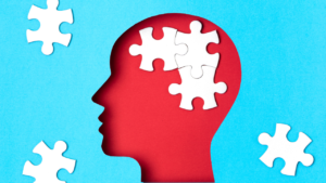 Brain with a puzzle piece inside it